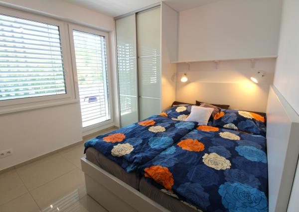 TOP!!! MODERNÝ 2I APARTMÁN S VEĽKÝM BALKÓNOM A PARKOVANÍM V NOVOSTAVBE