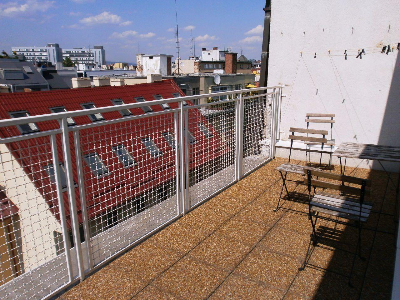 Štýlové bývanie v srdci mesta s veľkou terasou a panoramatickým výhľadom!